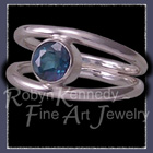Sterling Silver and Evergreen Topaz 'Orbit' Ring Image
