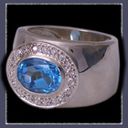 Sterling Silver, Genuine Blue Topaz and Cubic Zirconias Ring Image