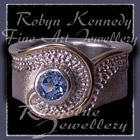 10 karat Yellow Gold, Sterlium Sterling Silver and Skyblue Topaz 'Dreamland' Ring Image