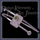 Sterling Silver and Genuine Peridot 'Fantasy' Bangle Bracelet Image