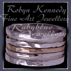 10 Karat Yellow Gold & argentium Sterling Silver 'Good Times Roll' Triple Spinner Ring Image