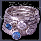 Sterling Silver, Ice Blue Topaz and Swiss Blue Topaz and Swarovski Cubic Zirconias, 'Revelry' Stacker Rings Image