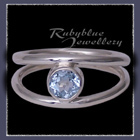 Sterling Silver and Genuine Ice Blue Topaz 'Iris' Ring Image