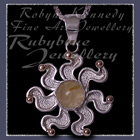 10 Karat Yellow Gold, Sterling Silver and Rutilated Quartz 'Sun' Pendant Image