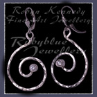 Sterling Silver and Cubic Zirconia 'Swirl' Earrings Image