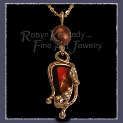 Canadian Ammolite, Chocolate Freshwater Pearl and 14 Karat Yellow Gold 'Chocolate Flame' Pendant Image