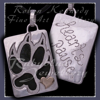 14 Karat Yellow Gold and Sterling Silver 'Hearts Pause' Pendant Image