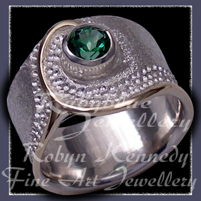 10 Karat Yellow Gold, Sterlium Sterling Silver and Genuine Rainforest Topaz 'Dreamland' Ring Image