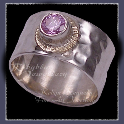 Sterling Silver, 14 Karat Gold and Genuine Swarovski Lavendar Cubic Zirconia  'Flair' Ring Image