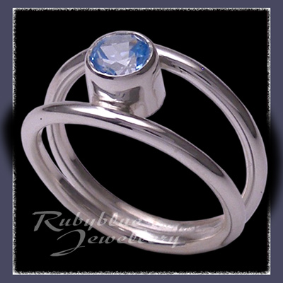 Sterling Silver and Genuine Ice Blue Topaz 'Iris' Ring Image