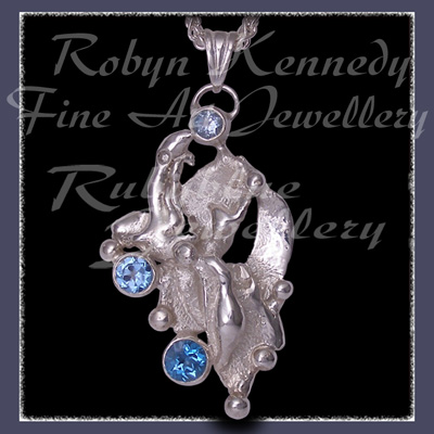 Sterling Silver, Sky Blue Topaz, Ice Blue Topaz and Swiss Blue Topaz 'Phoenix' Pendant Image