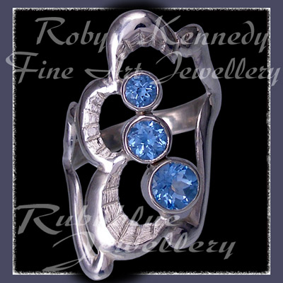 Sterling Silver and Swarovski Ice Blue Topaz 'Past, Present, Future' Ring Image