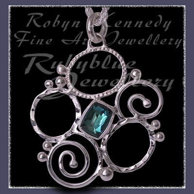 Sterling Silver and Mystic Blue Topaz 'Spring' Flower Pendant Image