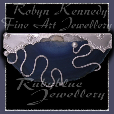 14 Karat Gold, Sterling Silve and Blue Lace Agate 'Sunset Beach' Image