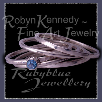 Sterling Silver, 18 Karat Yellow Gold and Turquoise Topaz 'Twinkles' Stacker Ring Set Image